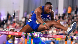 Holloway wins third successive world indoor 60m hurdles gold