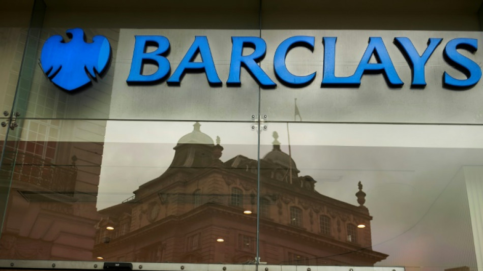 Barclays bank shares tumble as bad loans surge