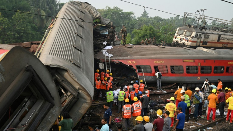 Indian officials seek cause of train crash that killed at least 288