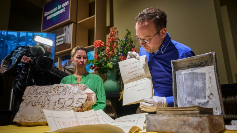 Dutch unveil century-old time capsule buried under king's statue