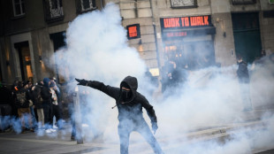 French protest over Macron forcing through pension reform