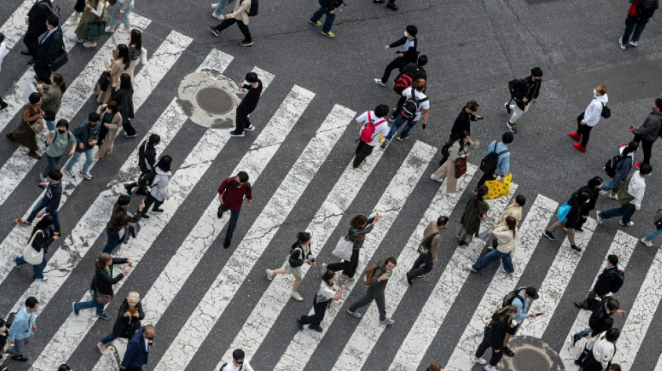 Markets mostly rise as traders try to look past expected rate hikes