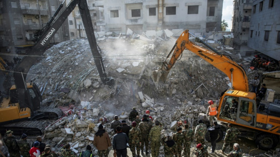 Quake-hit Syria city buries its dead on farmland