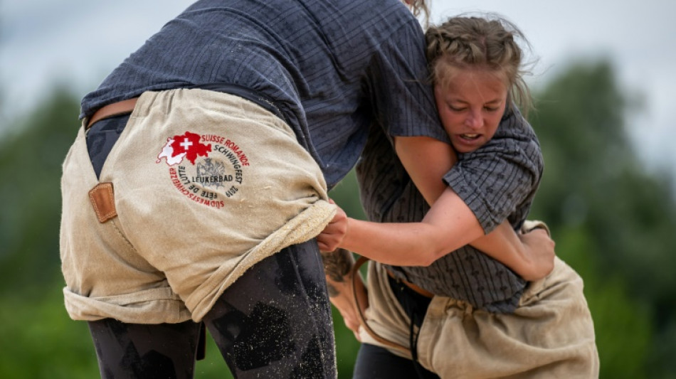 Women wrestlers battle for equality with Swiss 'schwinger kings'