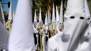 In Spain, brotherhood set up by slaves marches at Easter
