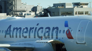 American Airlines reports loss on costs from new labor contract