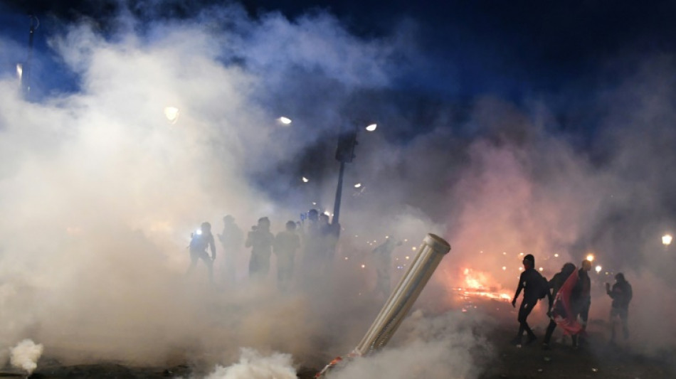 Protests rock France after Macron rams through pension reform